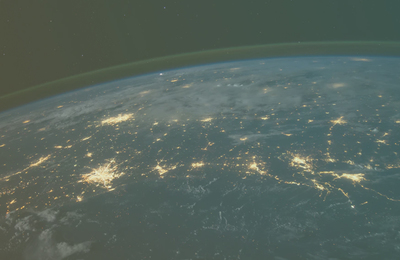 space view of earth with cities lit up