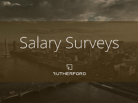 london city with text overlay saying salary surveys with rutherford logo