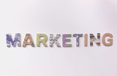 word marketing in colourful letters against white background