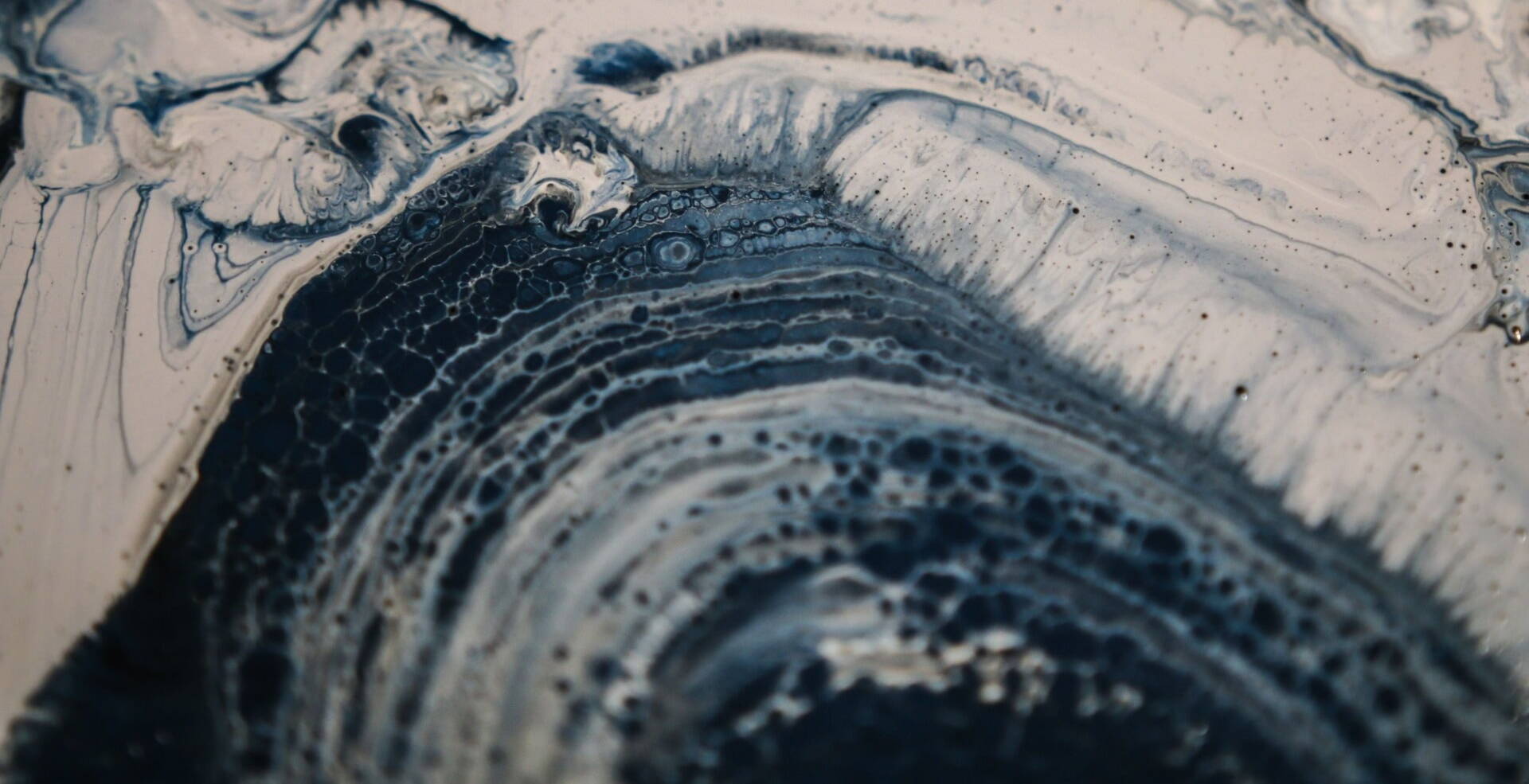 closeup of oil paint blue grey and white