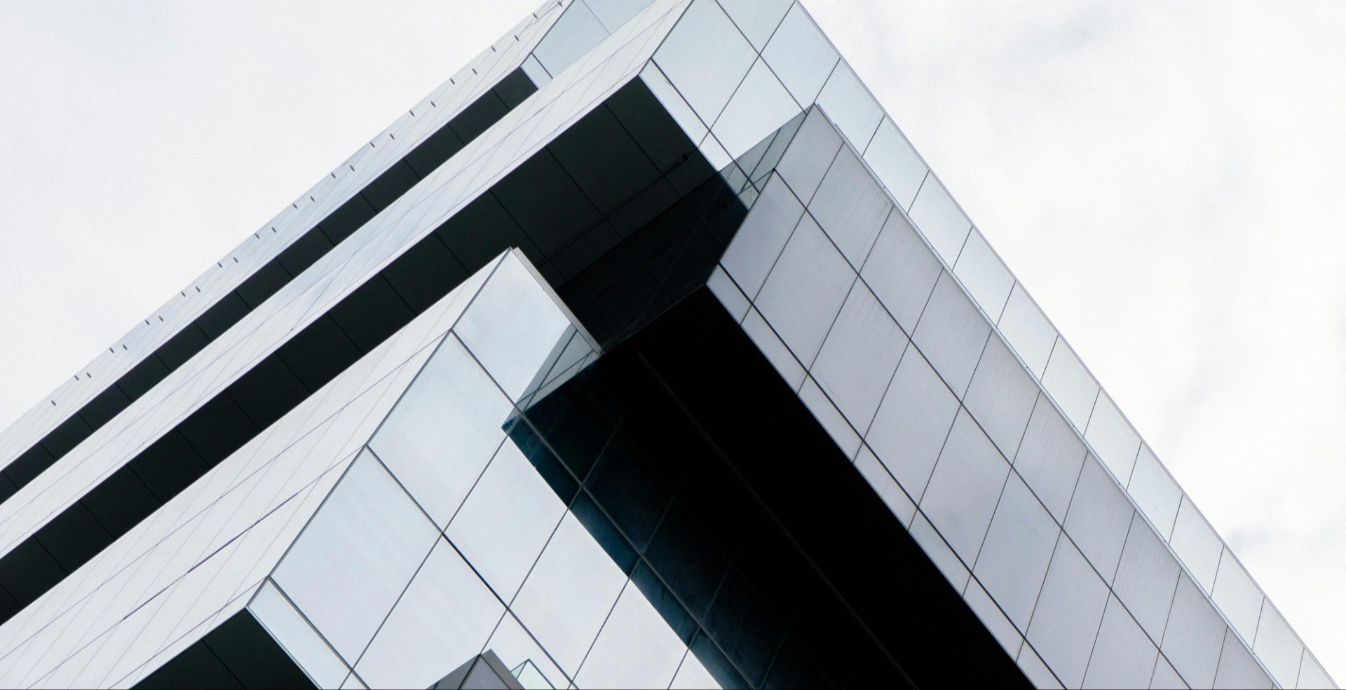 worm's view of a grey office building