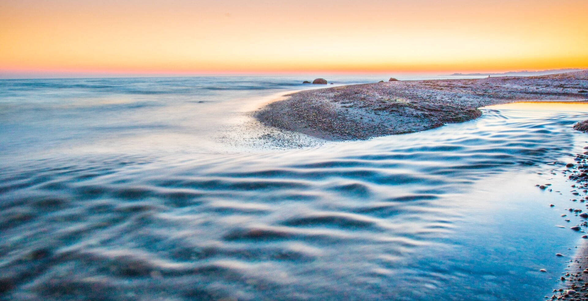 closeup of ocean waves at sunset