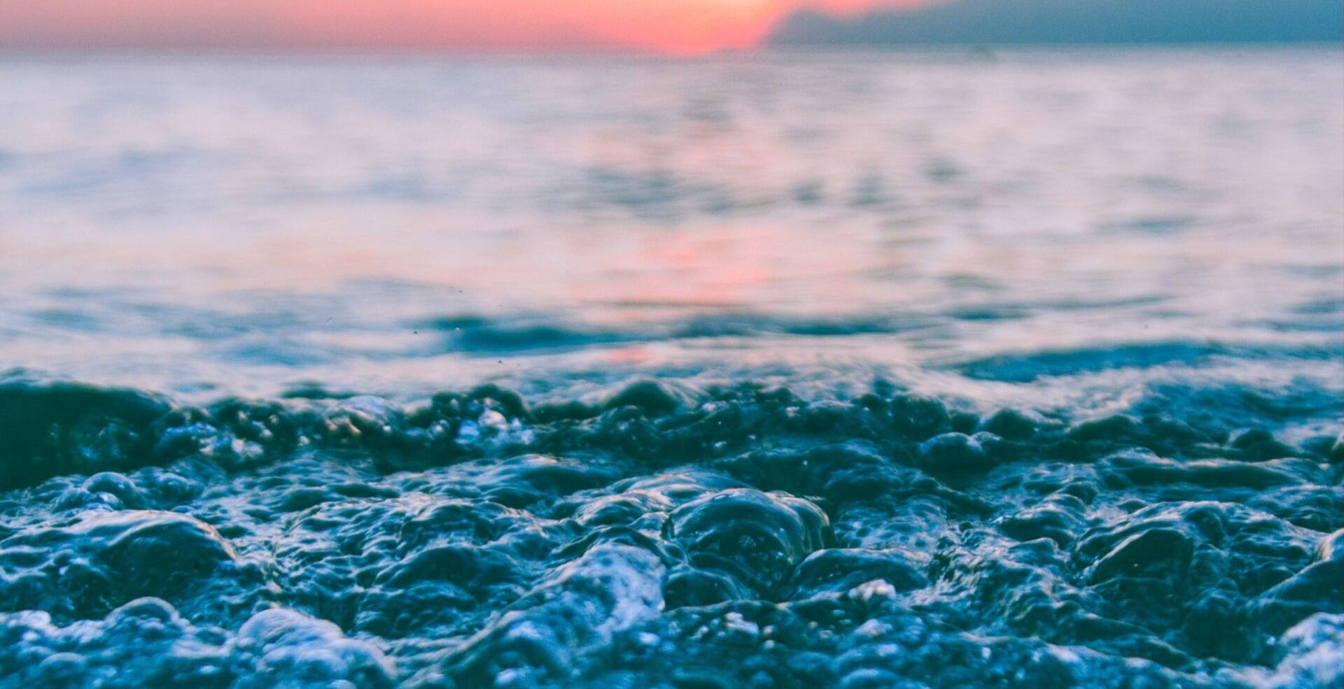 ocean waves with sunset