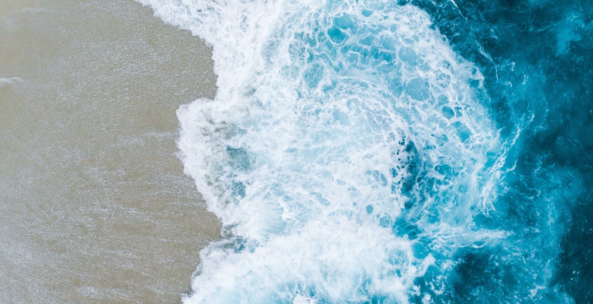 Waves crashing on beach 